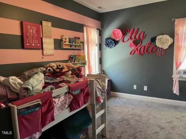 150 Cornerstone Lane Timberlake, NC 27583 - Photo 28 of 38 a bed room with a bed and a book shelf