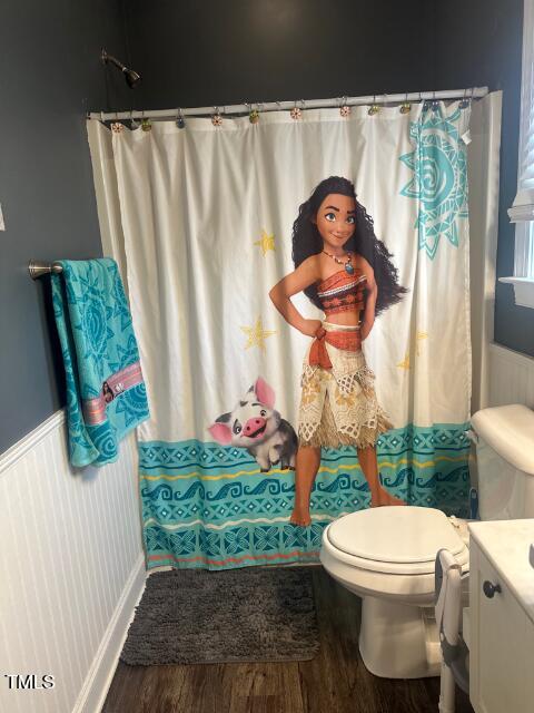 150 Cornerstone Lane Timberlake, NC 27583 - Photo 33 of 38 a bathroom with a toilet and a shower curtain