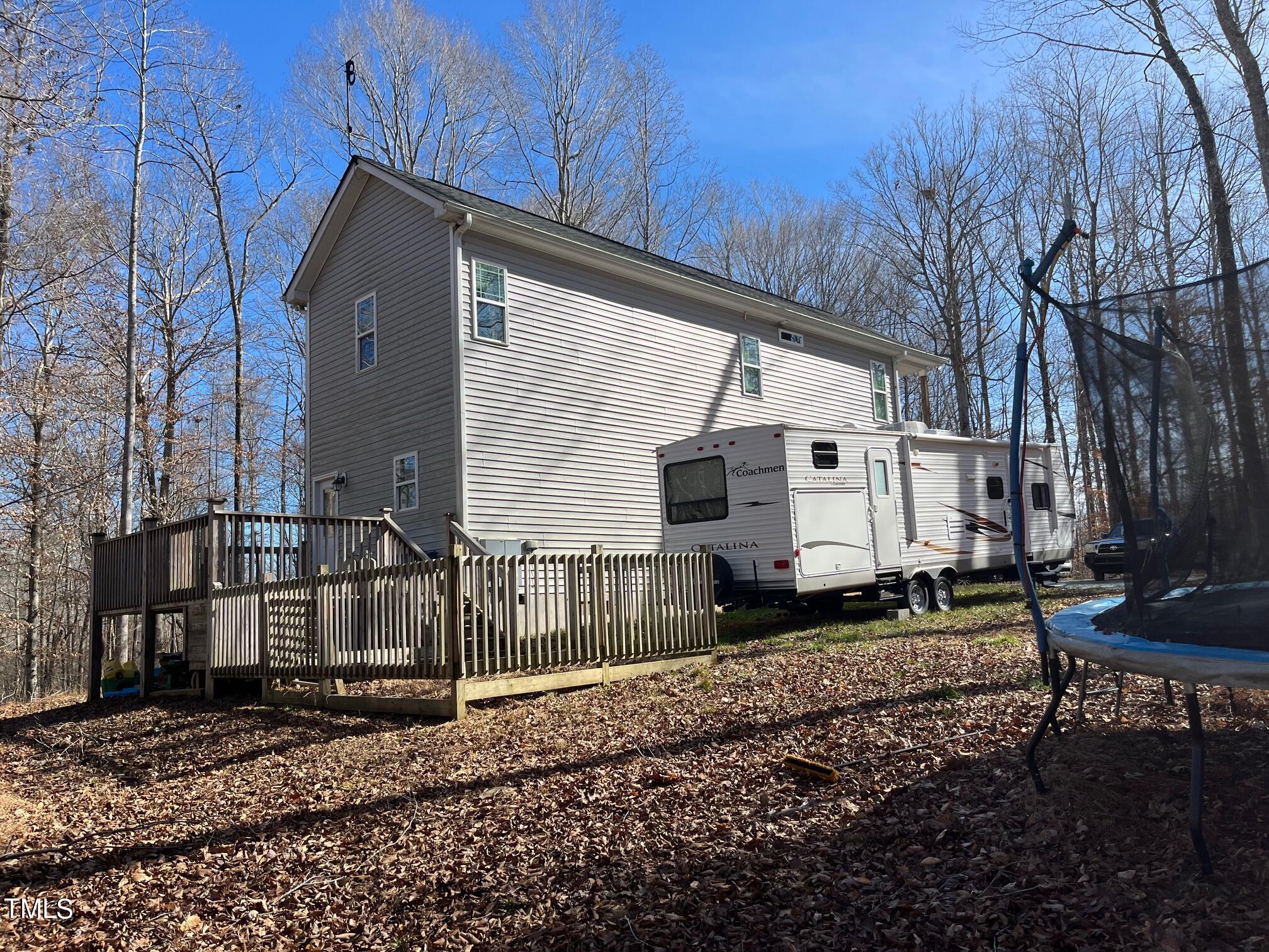150 Cornerstone Lane Timberlake, NC 27583 - Photo 7 of 38 a view of a back yard of the house