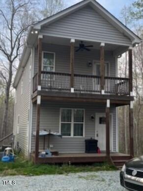 150 Cornerstone Lane Timberlake, NC 27583 - Photo 10 of 38 a front view of a house with a yard
