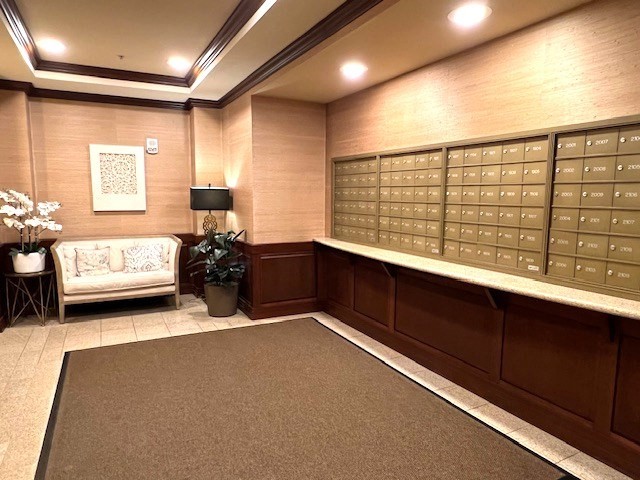 1 Nassau Street, Unit 1607 Boston, MA 02111 - Photo 13 of 17 a bedroom with furniture and a large window