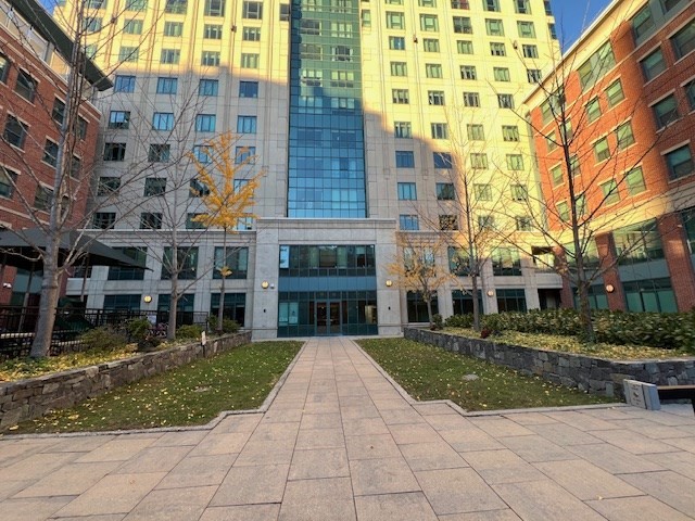 1 Nassau Street, Unit 1607 Boston, MA 02111 - Photo 15 of 17 a view of building with yard