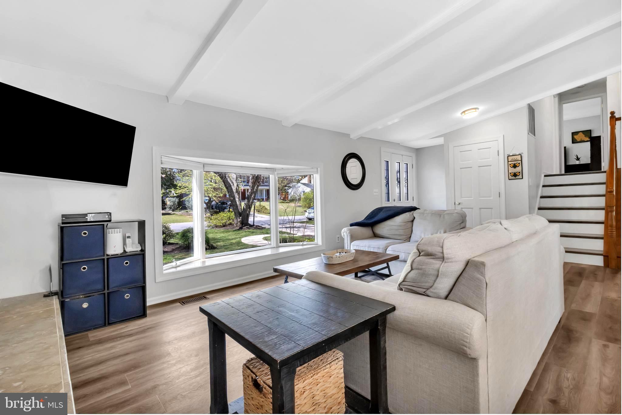 607 Bay Green Drive Arnold, MD 21012 - Photo 14 of 52 a living room with furniture and a flat screen tv