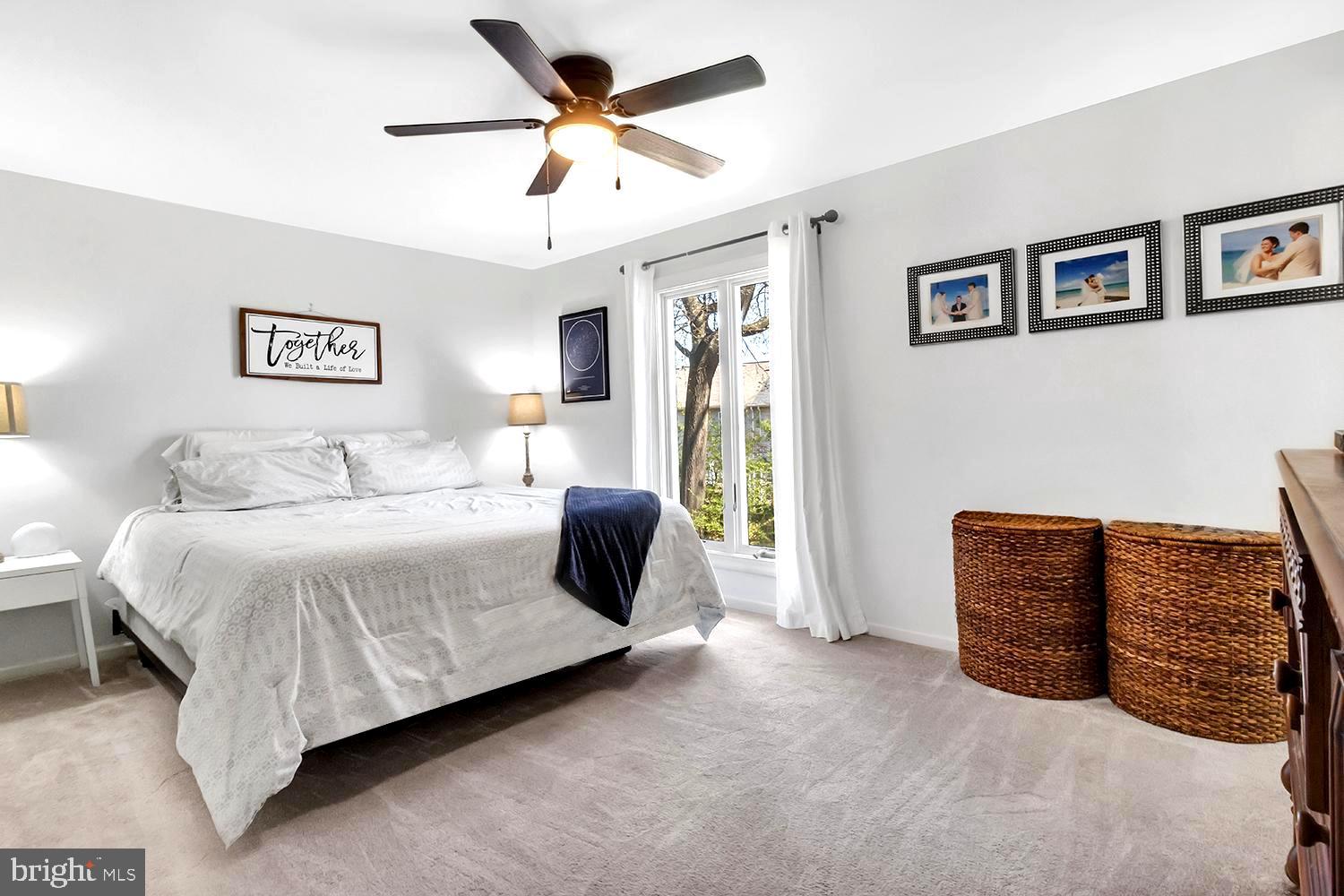 607 Bay Green Drive Arnold, MD 21012 - Photo 27 of 52 a bedroom with a bed and cabinets