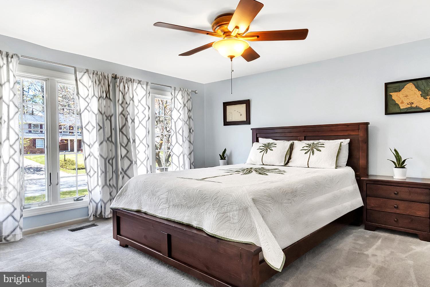 607 Bay Green Drive Arnold, MD 21012 - Photo 32 of 52 a bedroom with a bed and a large window