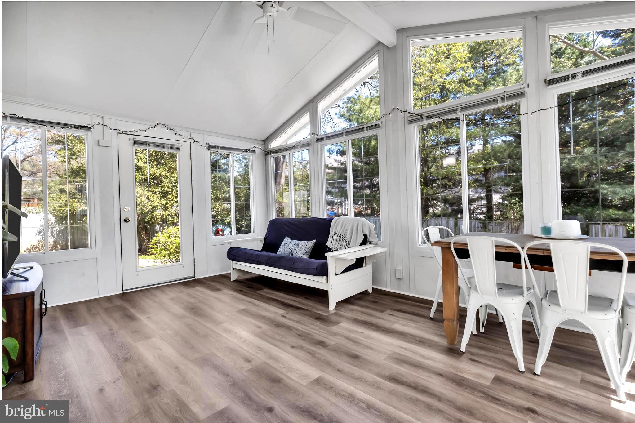 607 Bay Green Drive Arnold, MD 21012 - Photo 41 of 52 a living room with fireplace furniture and a large window