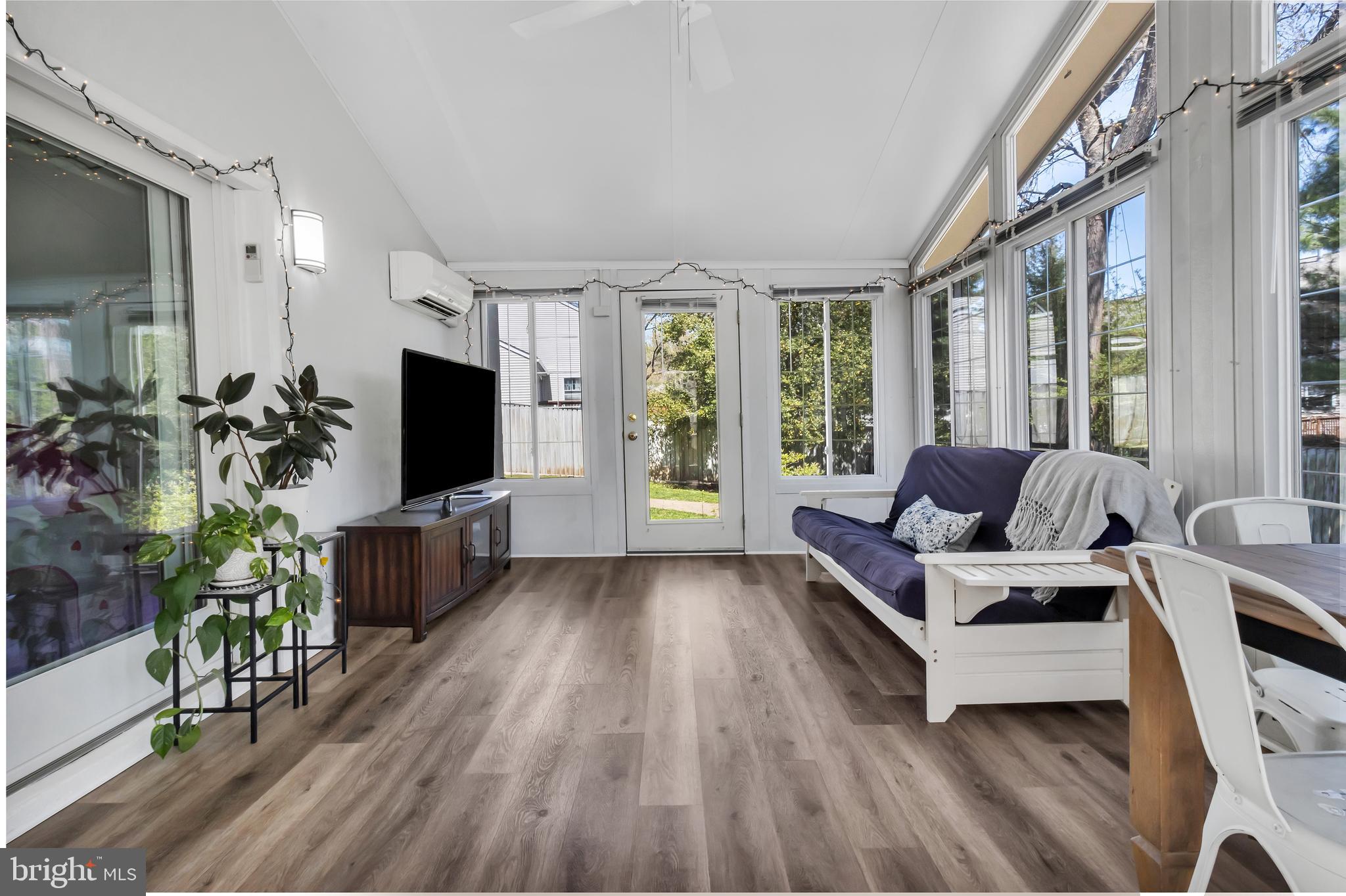607 Bay Green Drive Arnold, MD 21012 - Photo 42 of 52 a living room with furniture and a flat screen tv