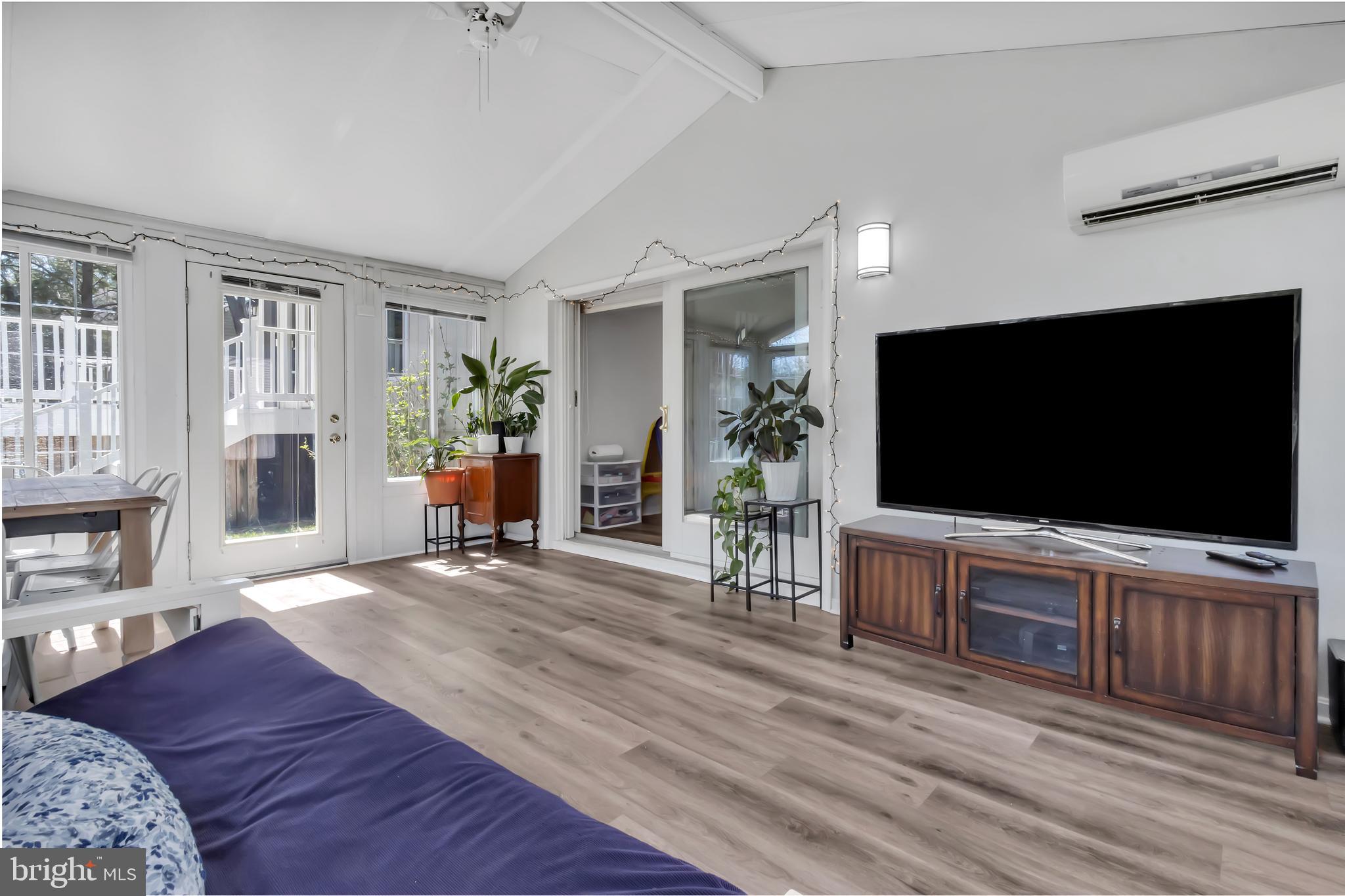 607 Bay Green Drive Arnold, MD 21012 - Photo 43 of 52 a living room with furniture and a flat screen tv