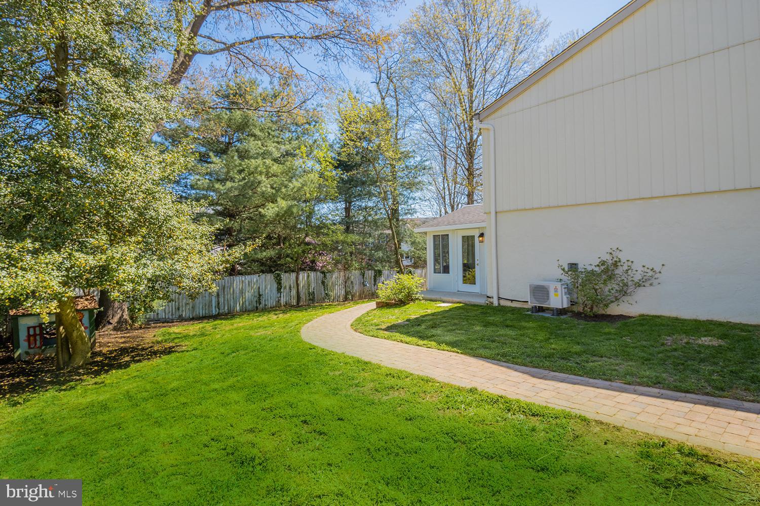 607 Bay Green Drive Arnold, MD 21012 - Photo 5 of 52 a view of a backyard with plants and large trees