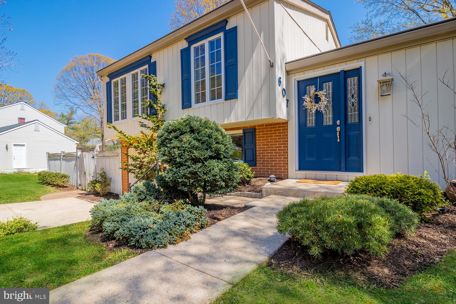 607 Bay Green Drive Arnold, MD 21012 - Photo 9 of 52 a front view of house and yard with green space
