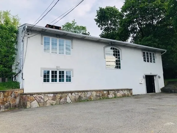 a front view of a house with a garage