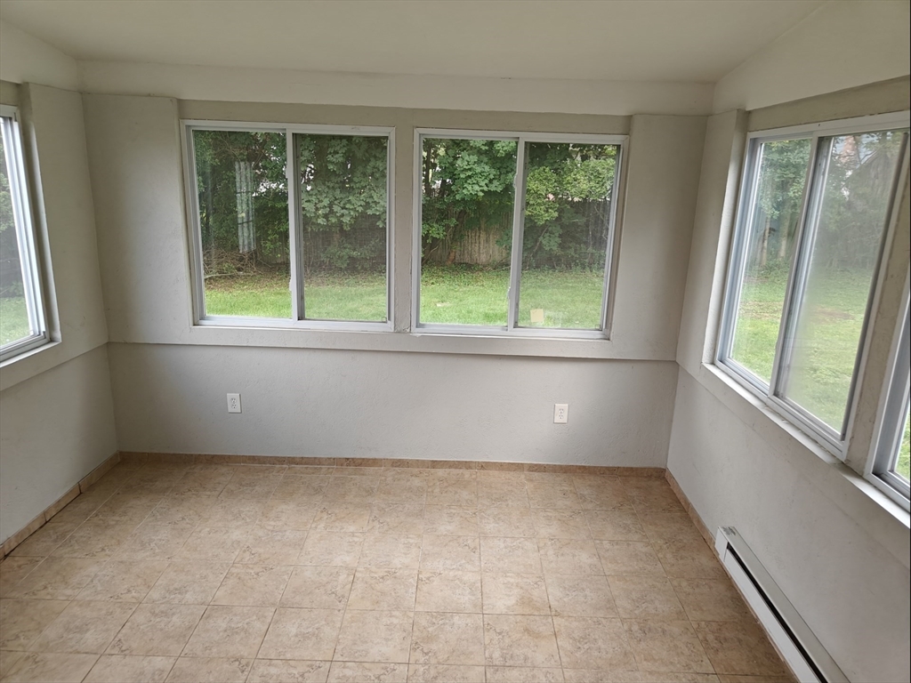 548 Worcester Street Natick, MA 01760 - Photo 19 of 21 an empty room with a window