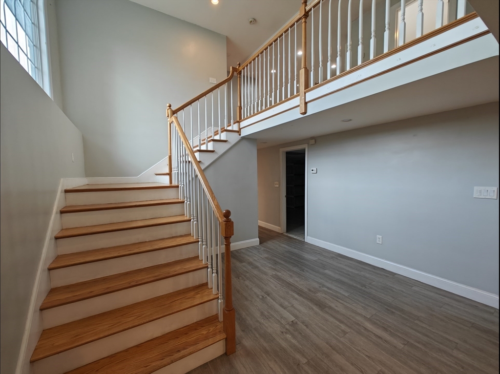 548 Worcester Street Natick, MA 01760 - Photo 7 of 21 a view of entryway with wooden floor