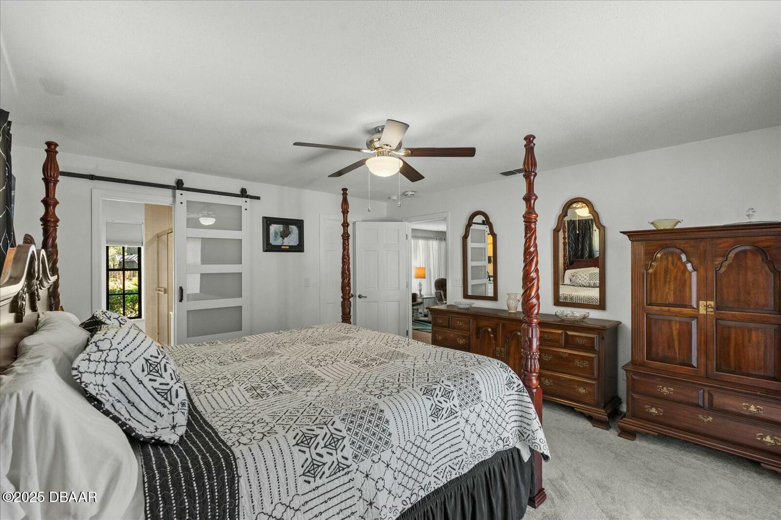 1 Cobblestone Trail Ormond Beach, FL 32174 - Photo 22 of 31 a bedroom with a bed dresser and a window