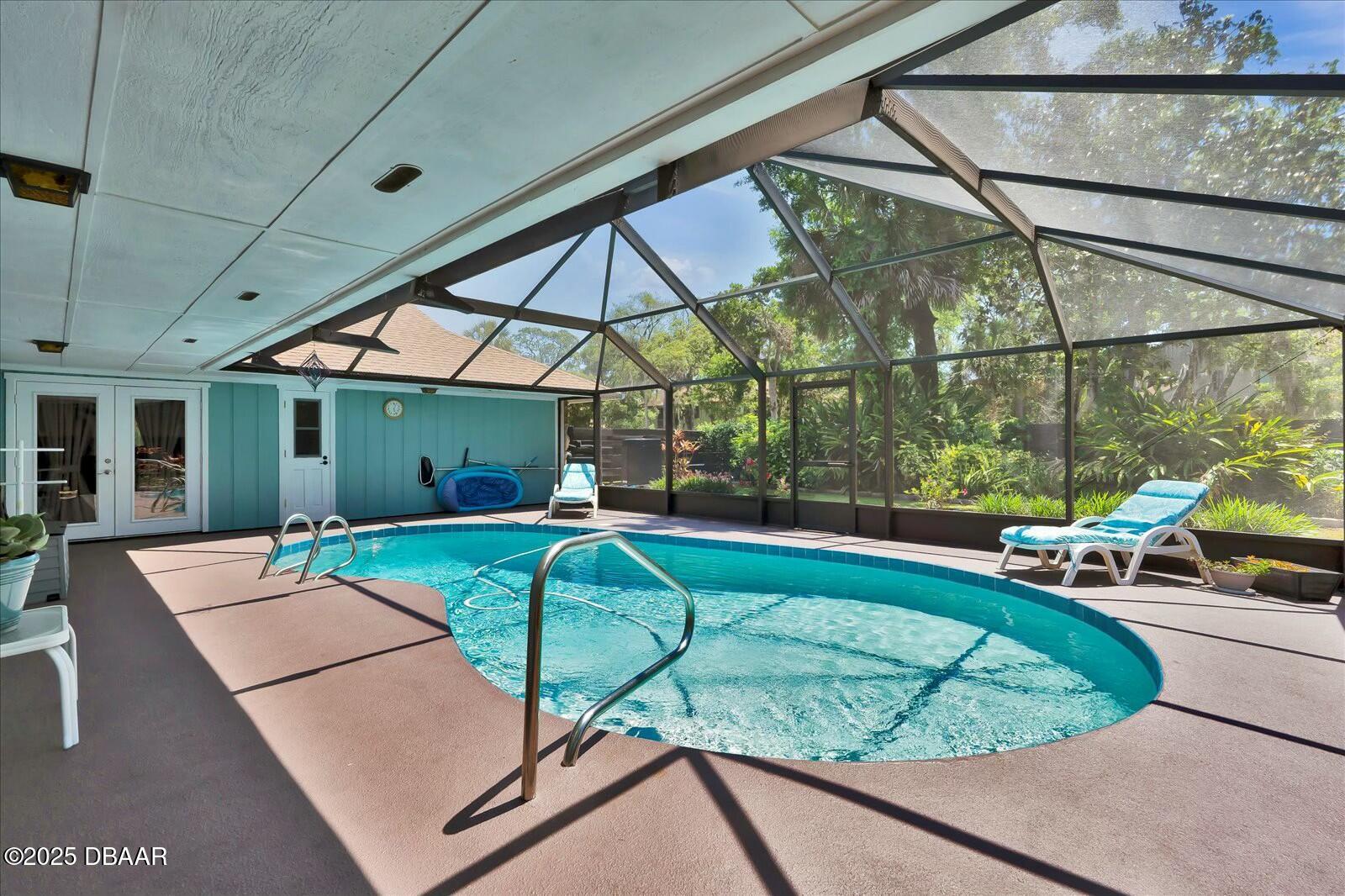 1 Cobblestone Trail Ormond Beach, FL 32174 - Photo 27 of 31 a view of a swimming pool with a patio