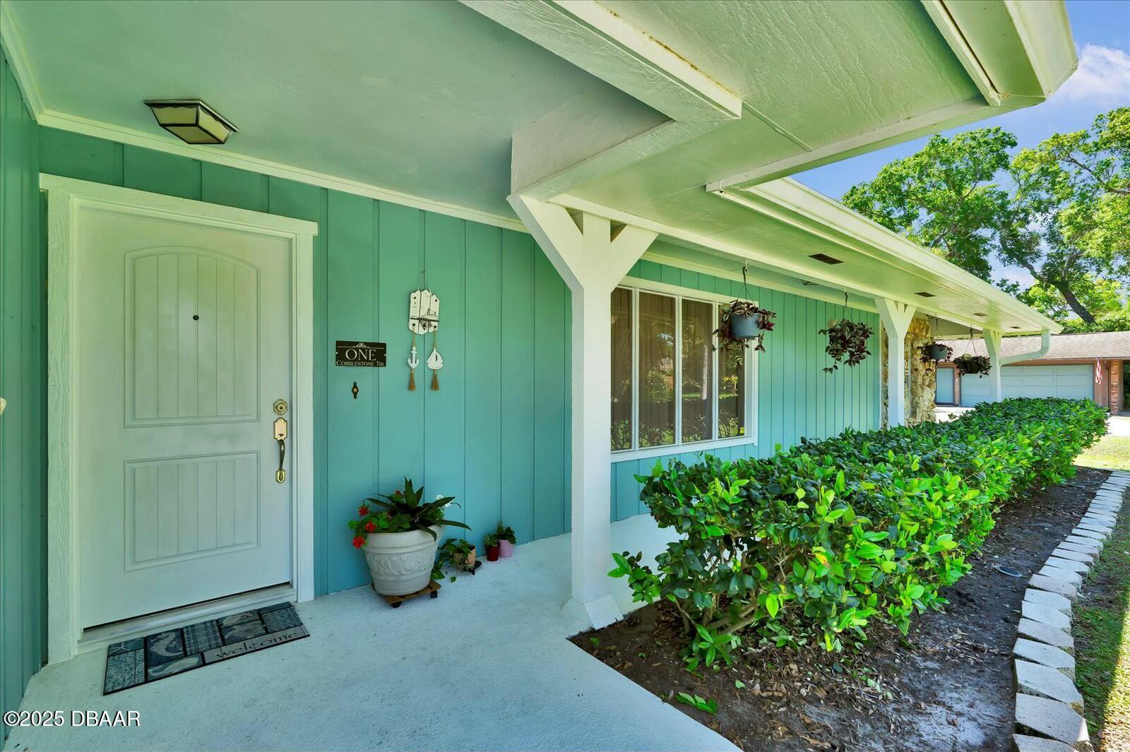 1 Cobblestone Trail Ormond Beach, FL 32174 - Photo 3 of 31 a view of a house with backyard