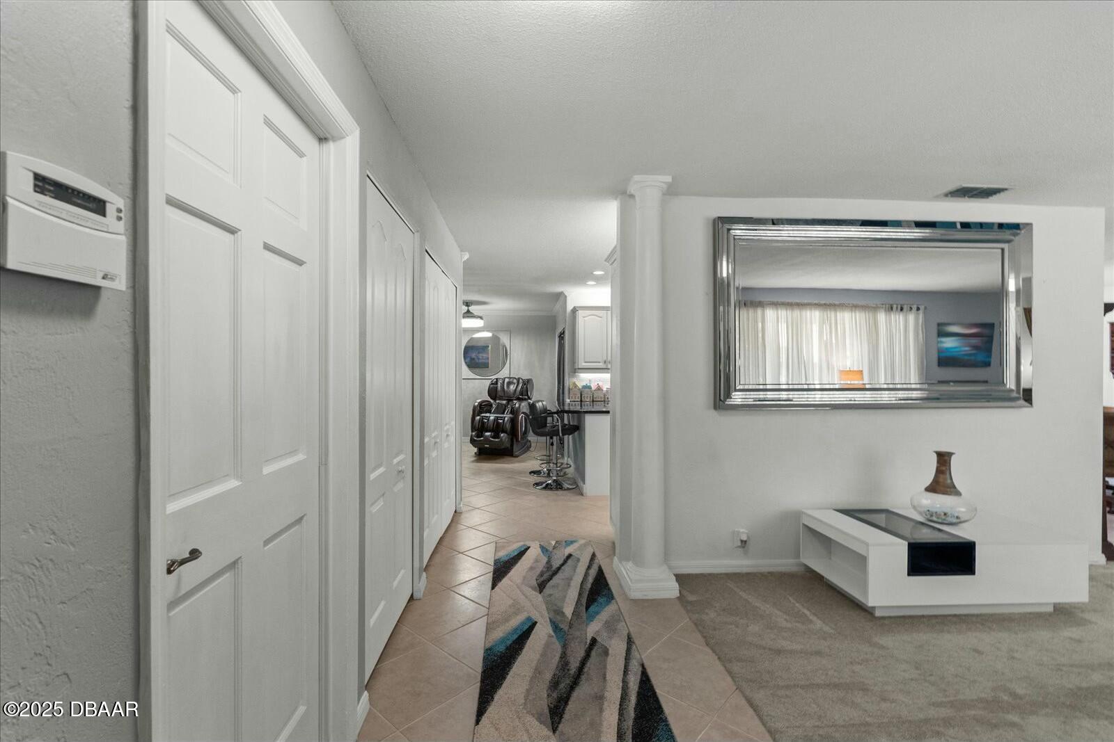 1 Cobblestone Trail Ormond Beach, FL 32174 - Photo 6 of 31 a spacious bathroom with a mirror and a sink