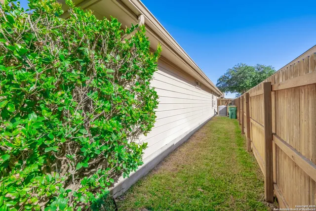 a view of yard along with trees