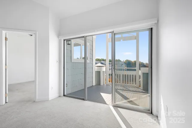 a view of a kitchen with a fireplace a kitchen view and a window