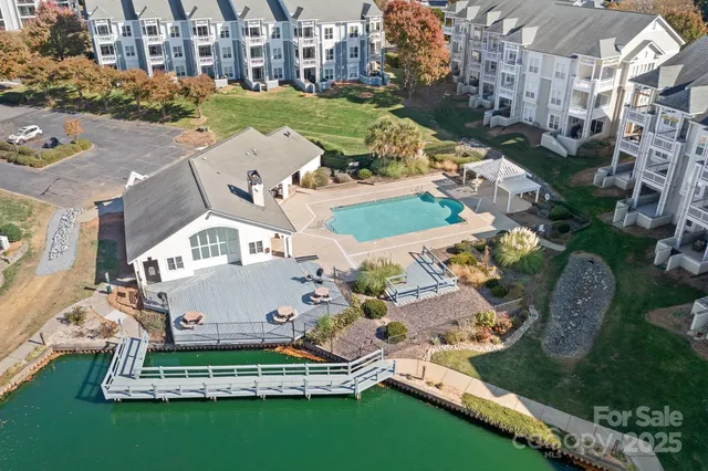 an aerial view of residential building with parking space