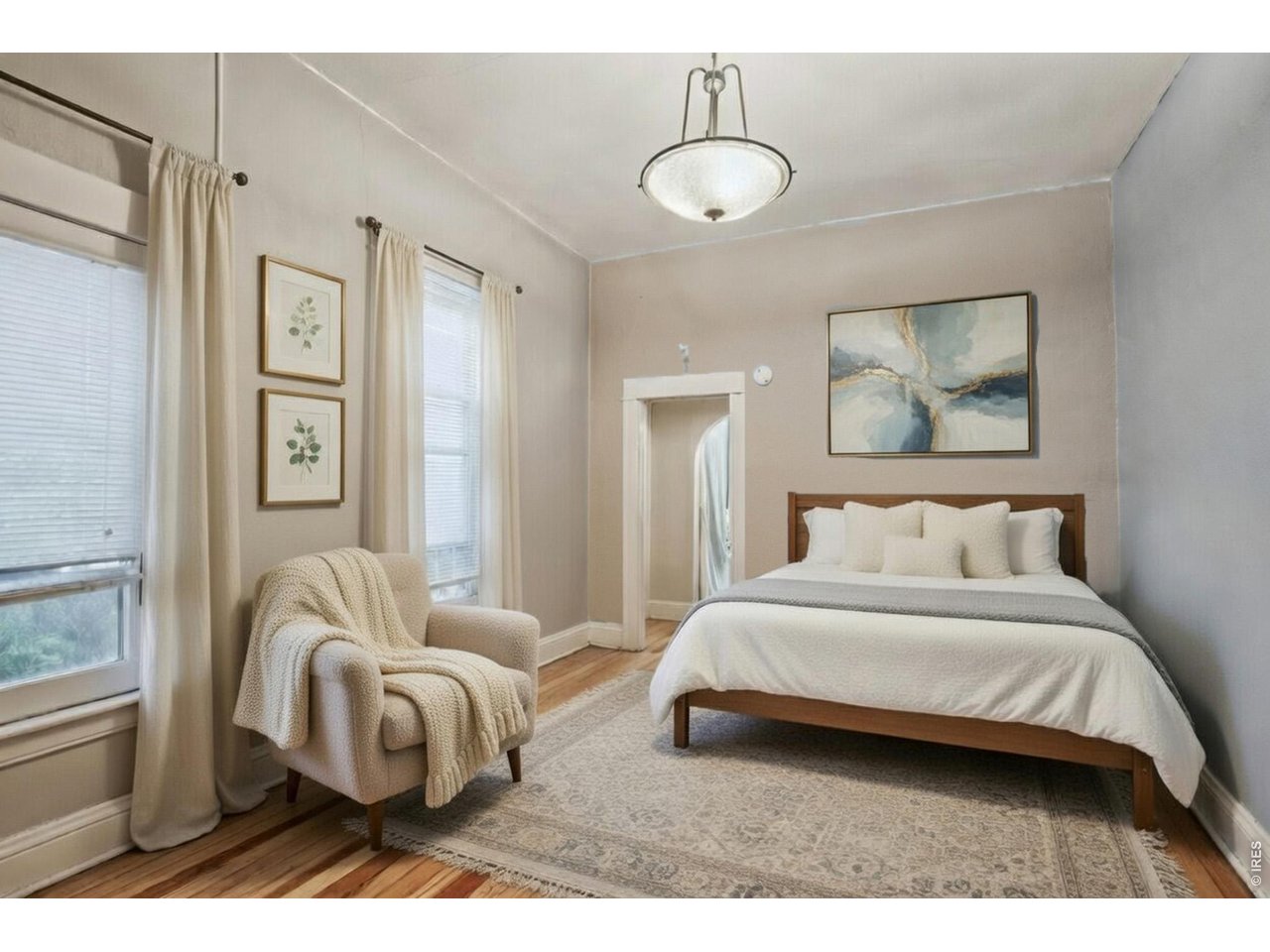 530 Mathews Street Fort Collins, CO 80524 - Photo 19 of 39 a bedroom with a bed and a painting on the wall