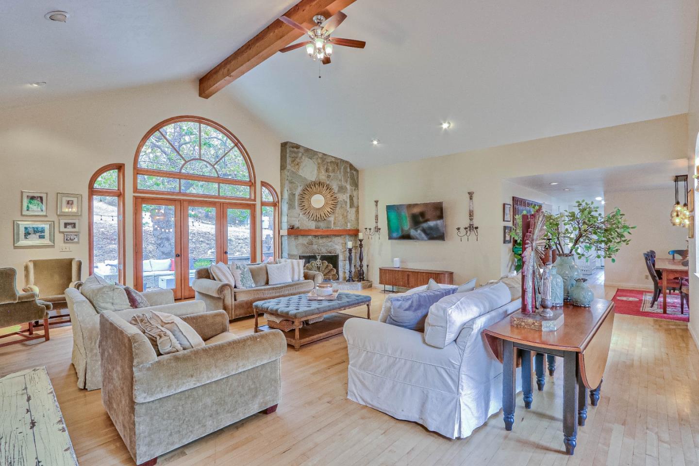 180 San Benancio Road Salinas, CA 93908 - Photo 6 of 27 a living room with furniture a large window and a clock