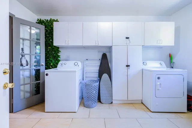 a kitchen with stainless steel appliances granite countertop lots of counter top space