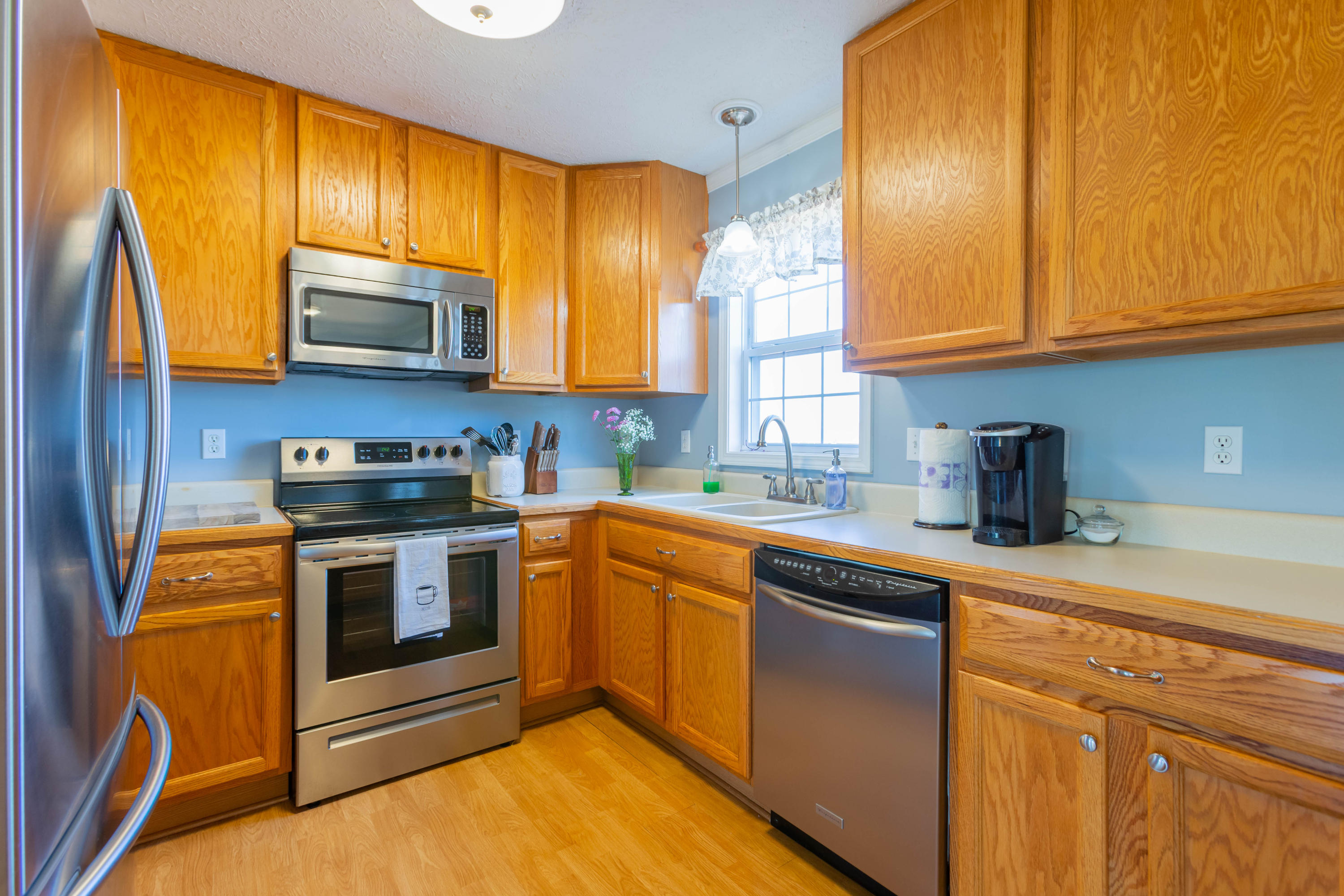 35 Blankenship Road Rocky Mount, VA 24151 - Photo 12 of 36 a kitchen with stainless steel appliances granite countertop a stove a sink and a microwave