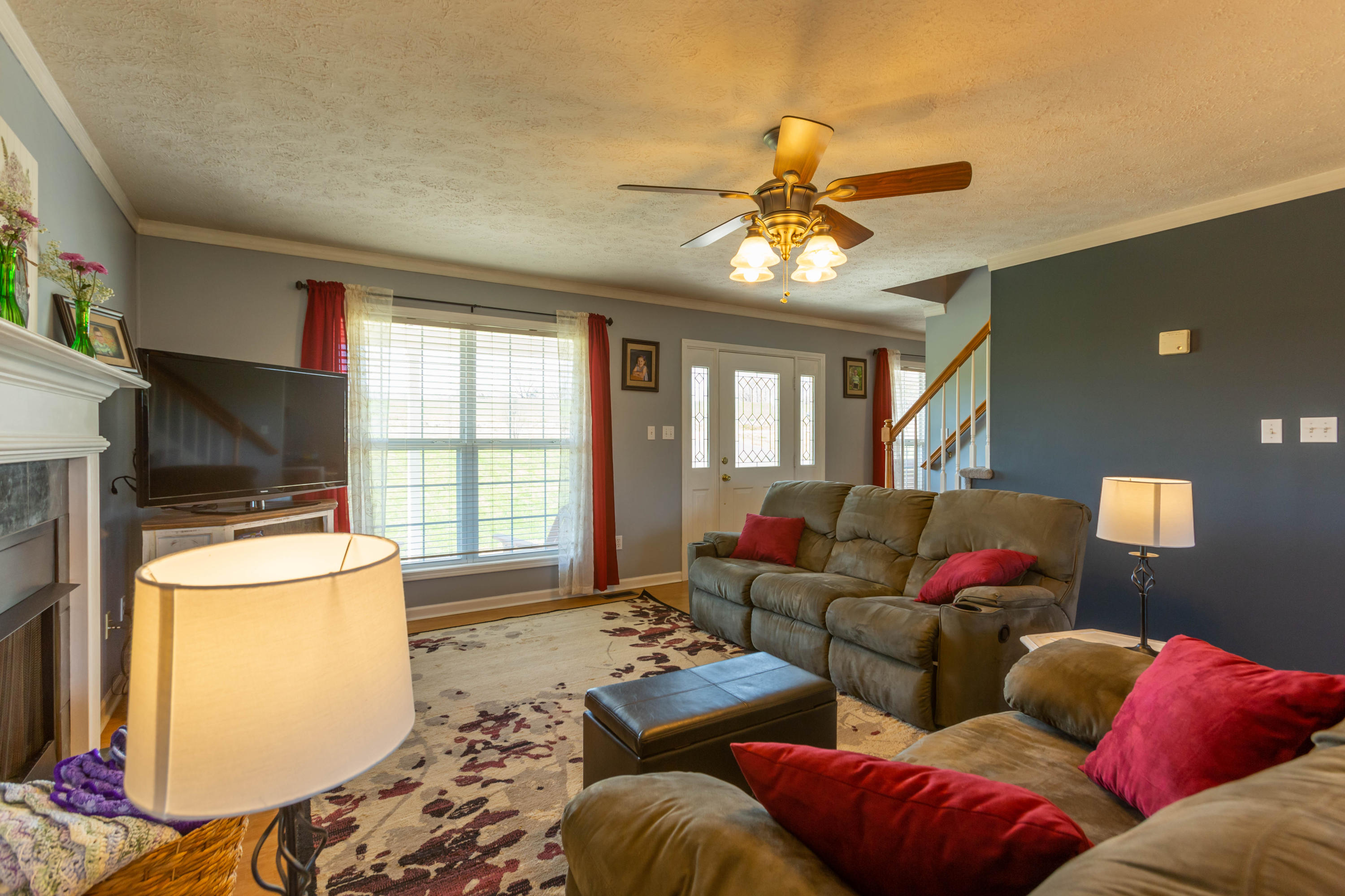 35 Blankenship Road Rocky Mount, VA 24151 - Photo 14 of 36 a living room with furniture a flat screen tv and a window