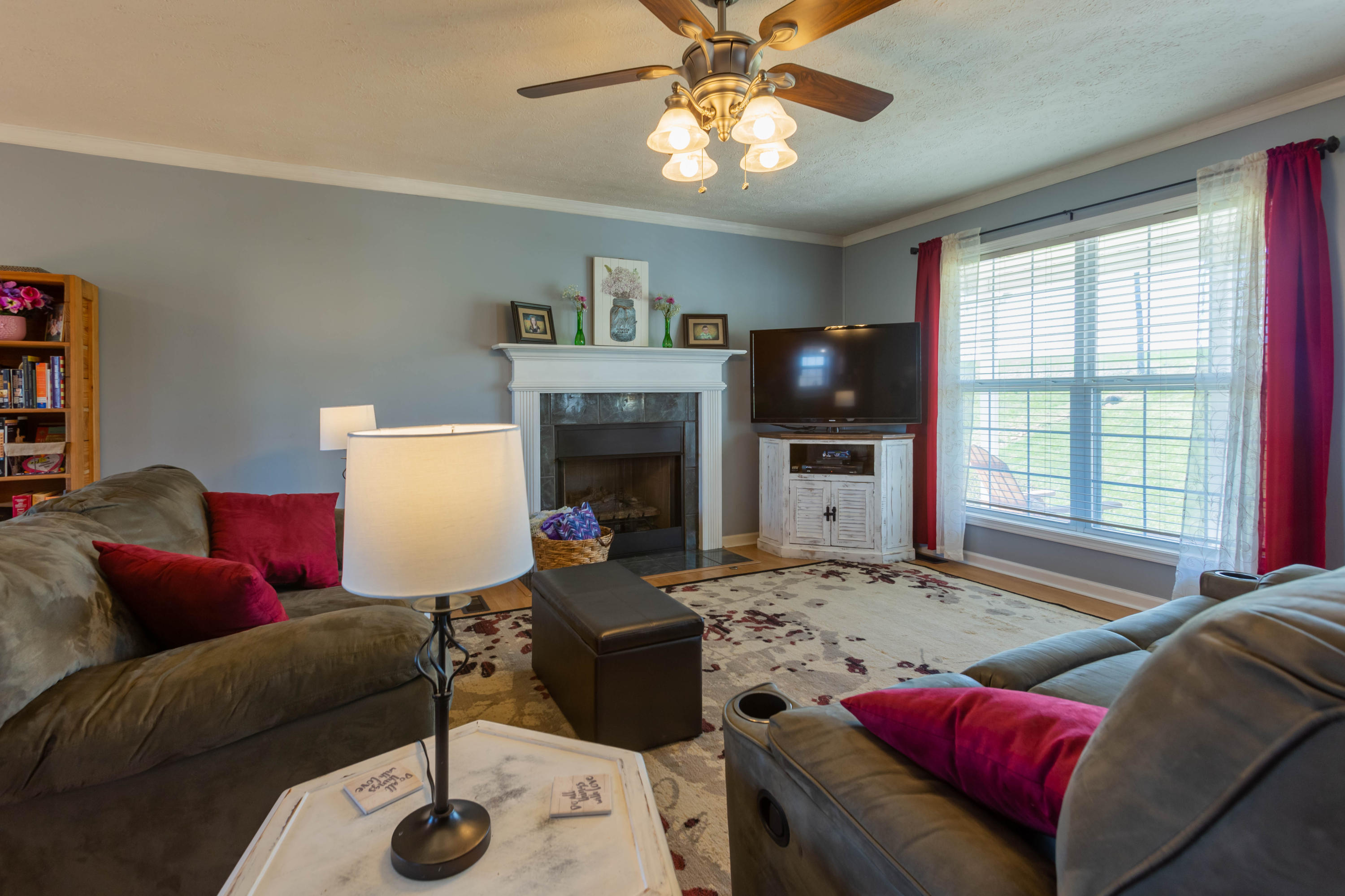35 Blankenship Road Rocky Mount, VA 24151 - Photo 16 of 36 a living room with furniture kitchen view and a fireplace