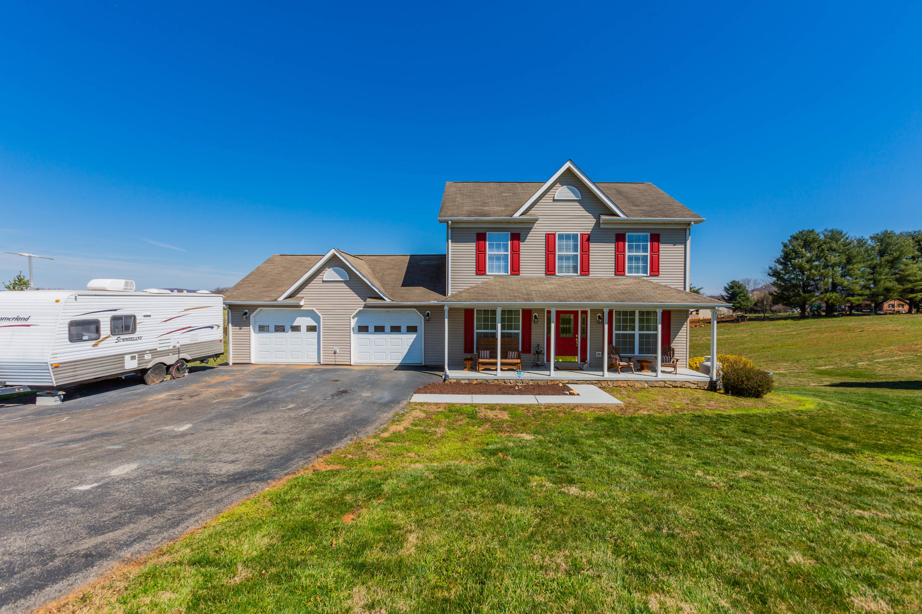 35 Blankenship Road Rocky Mount, VA 24151 - Photo 3 of 36 a view of a house with a big yard and large trees