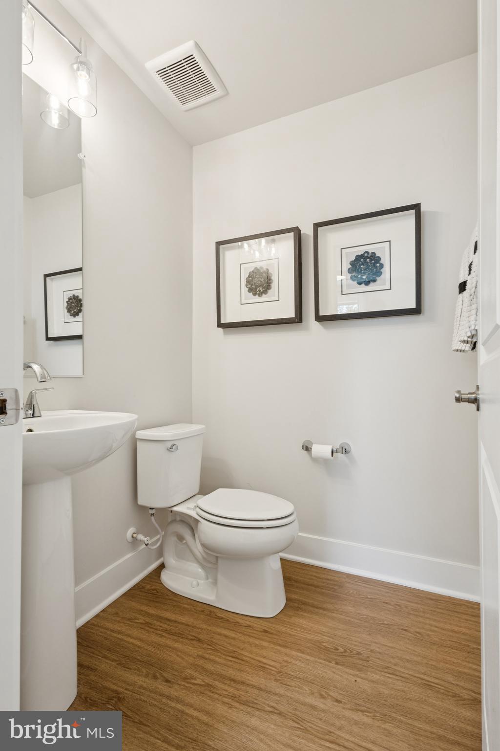 13722 Cobble Loop Woodbridge, VA 22193 - Photo 15 of 27 a bathroom with a toilet and a shower