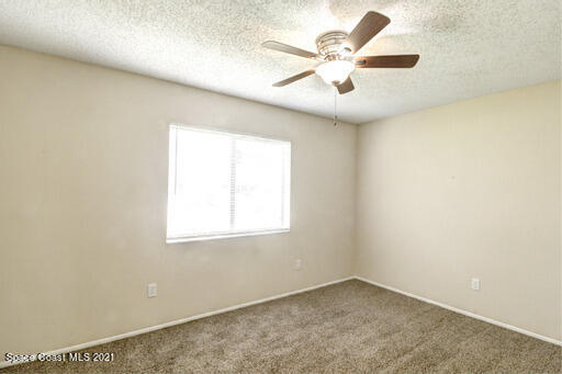 1663 Falk Terrace Southeast Palm Bay, FL 32909 - Photo 14 of 31 an empty room with a window