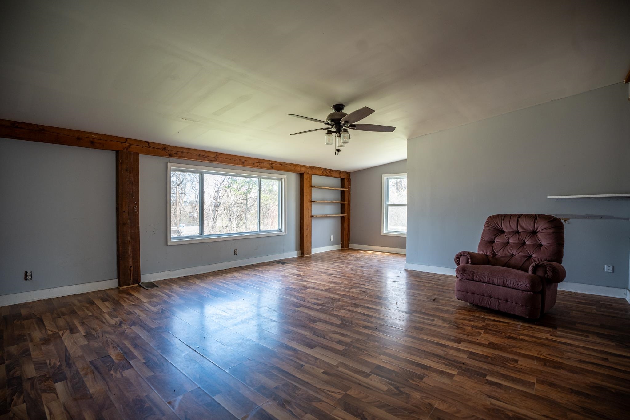 14189 East Dutch Road Rochelle, IL 61068 - Photo 12 of 65 a view of livingroom with hardwood floor and ceiling fan