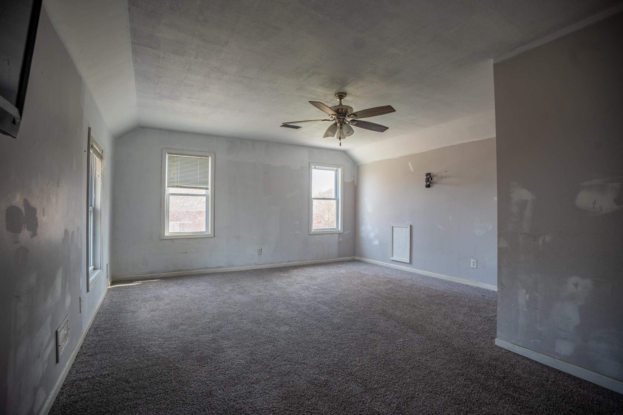 14189 East Dutch Road Rochelle, IL 61068 - Photo 26 of 65 a view of a livingroom with a ceiling fan and window