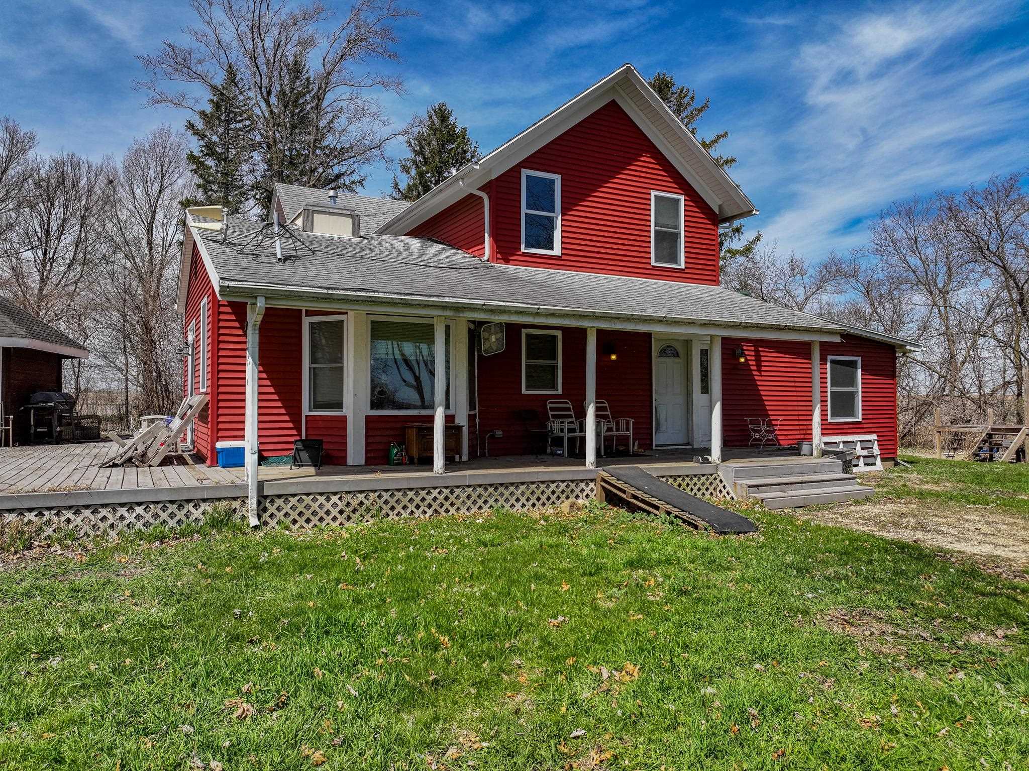 14189 East Dutch Road Rochelle, IL 61068 - Photo 3 of 65 a front view of a house with a yard