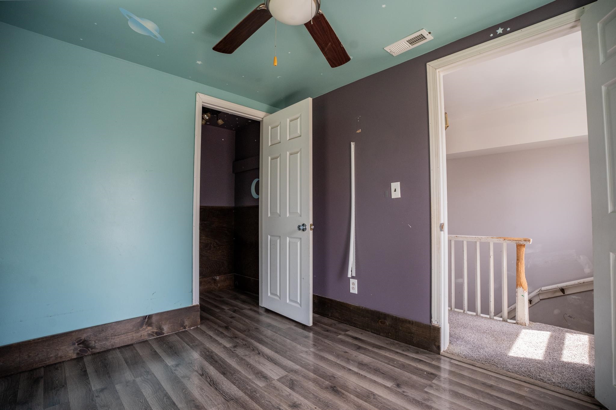 14189 East Dutch Road Rochelle, IL 61068 - Photo 31 of 65 a view of an empty room with wooden floor and a window