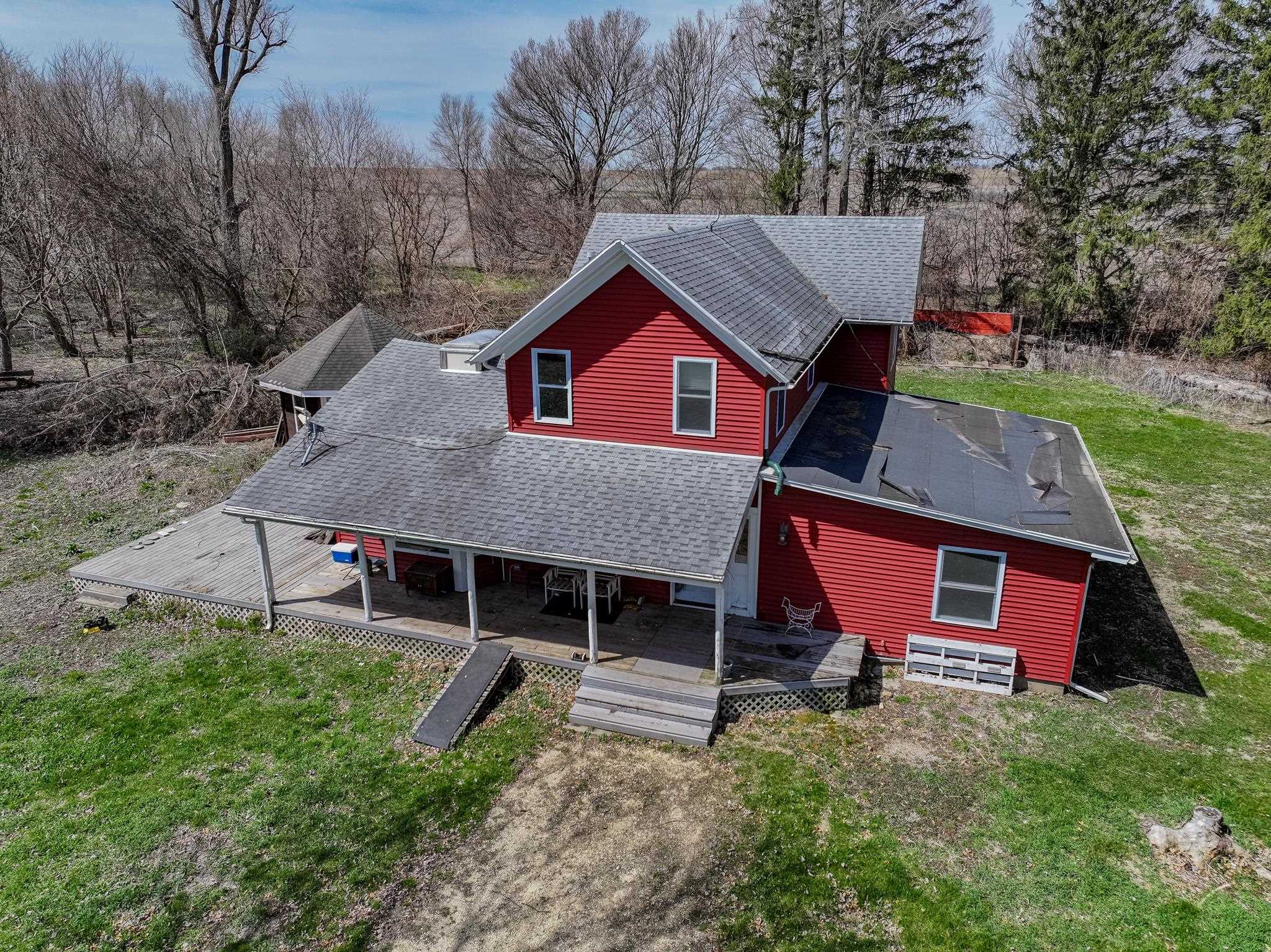 14189 East Dutch Road Rochelle, IL 61068 - Photo 34 of 65 an aerial view of a house with a yard table and chairs