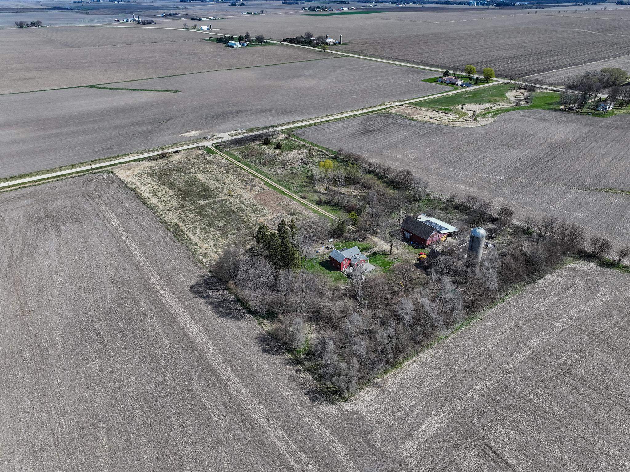 14189 East Dutch Road Rochelle, IL 61068 - Photo 50 of 65 a view of a wooden floor with a yard