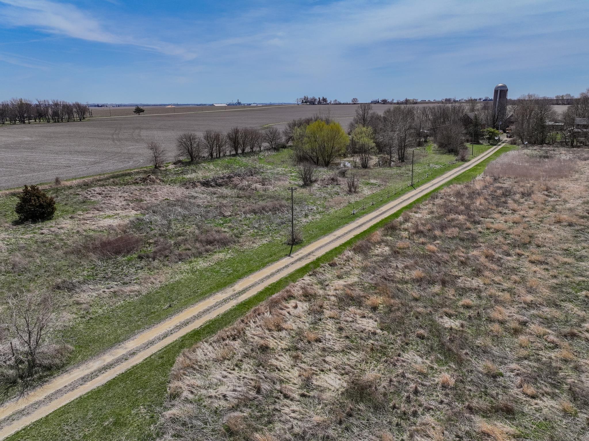 14189 East Dutch Road Rochelle, IL 61068 - Photo 56 of 65 a view of a yard with mountain