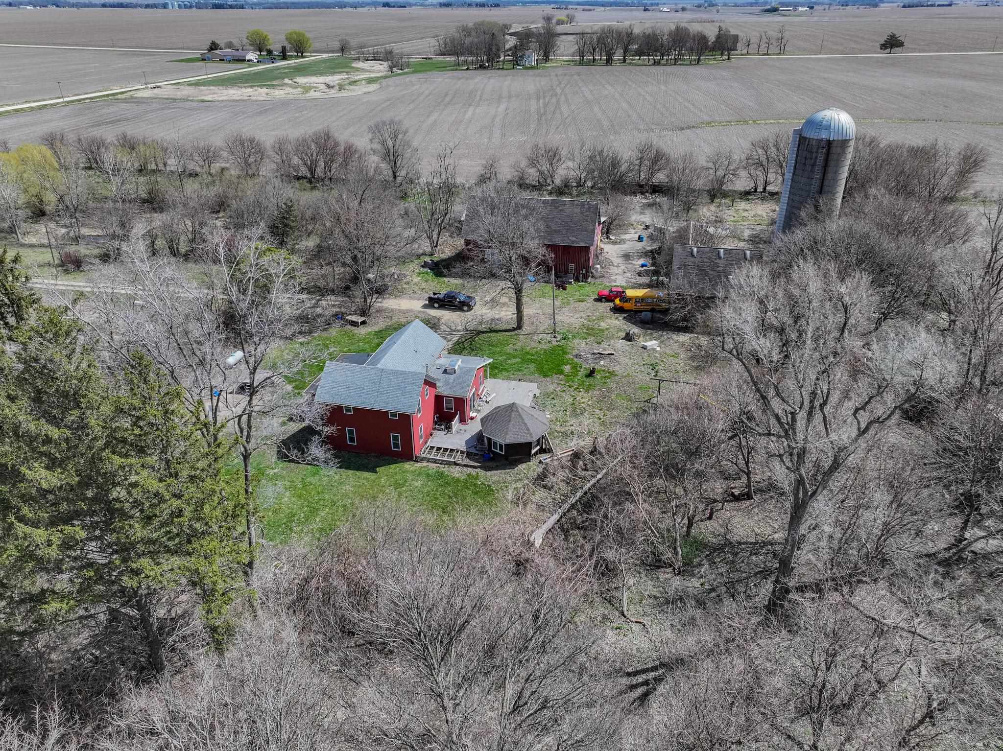 14189 East Dutch Road Rochelle, IL 61068 - Photo 10 of 65 a backyard of a house with lots of green space