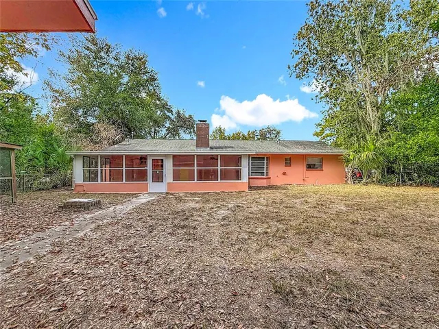 a view of a yard with an outdoor space