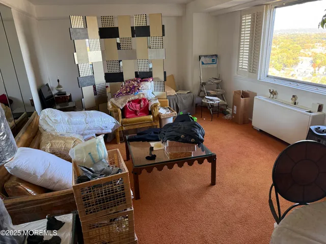 a stove top oven sitting inside of a kitchen