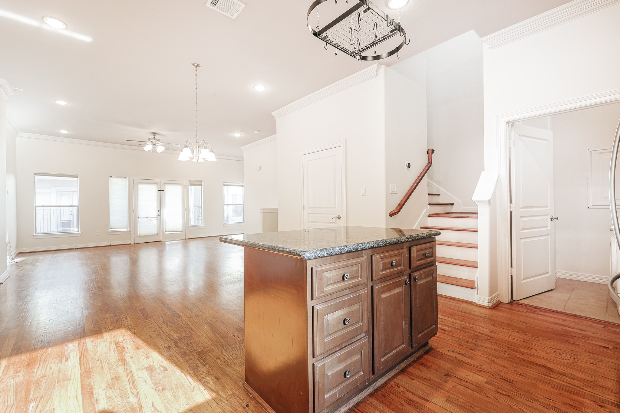 2540 Prospect Street, Unit C Houston, TX 77004 - Photo 12 of 31 a kitchen with stainless steel appliances granite countertop a stove and a wooden floors