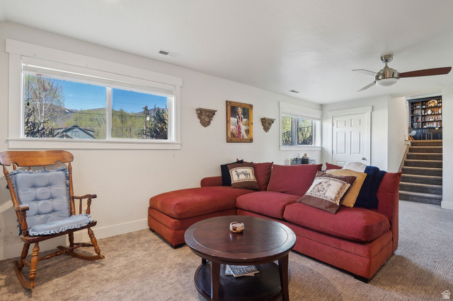 550 Pine Canyon Road Midway, UT 84049 - Photo 26 of 44 Lower-level living area featuring neutral carpet flooring and white painted walls
