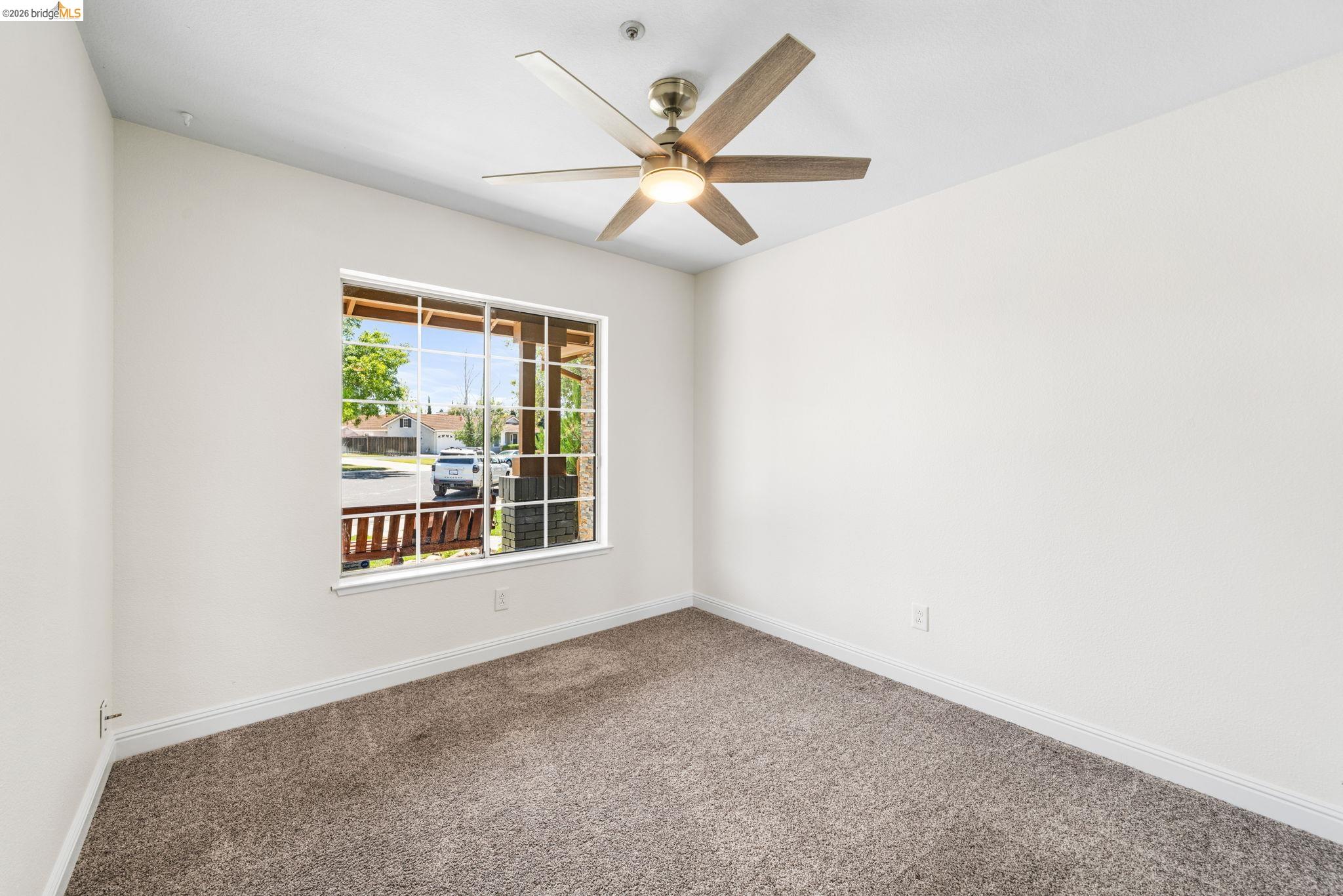 1186 El Rio Court Livermore, CA 94551 - Photo 23 of 60 Room with neutral-toned carpeting and white baseboards