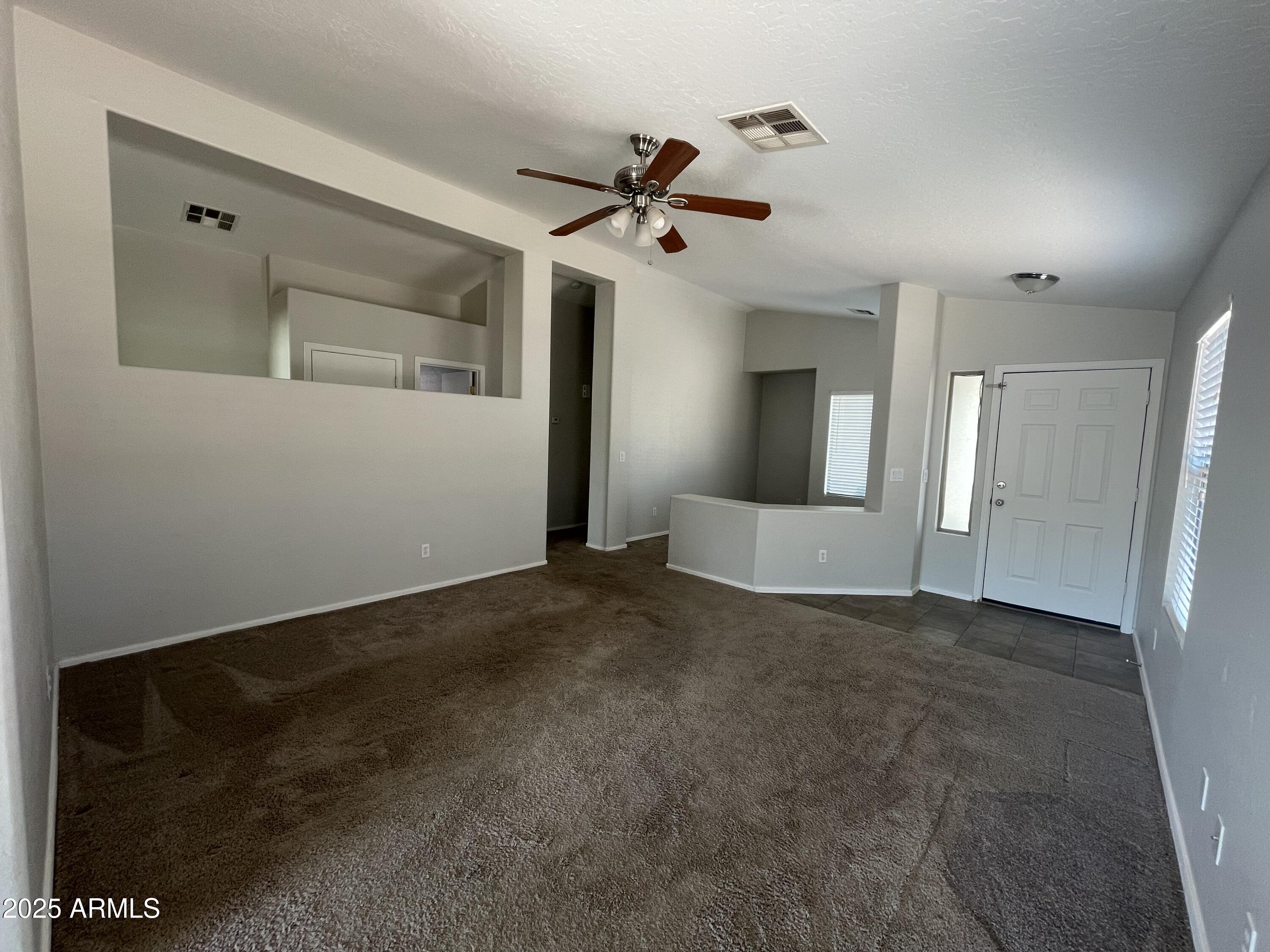 14859 West Redfield Road Surprise, AZ 85379 - Photo 5 of 16 Great Room