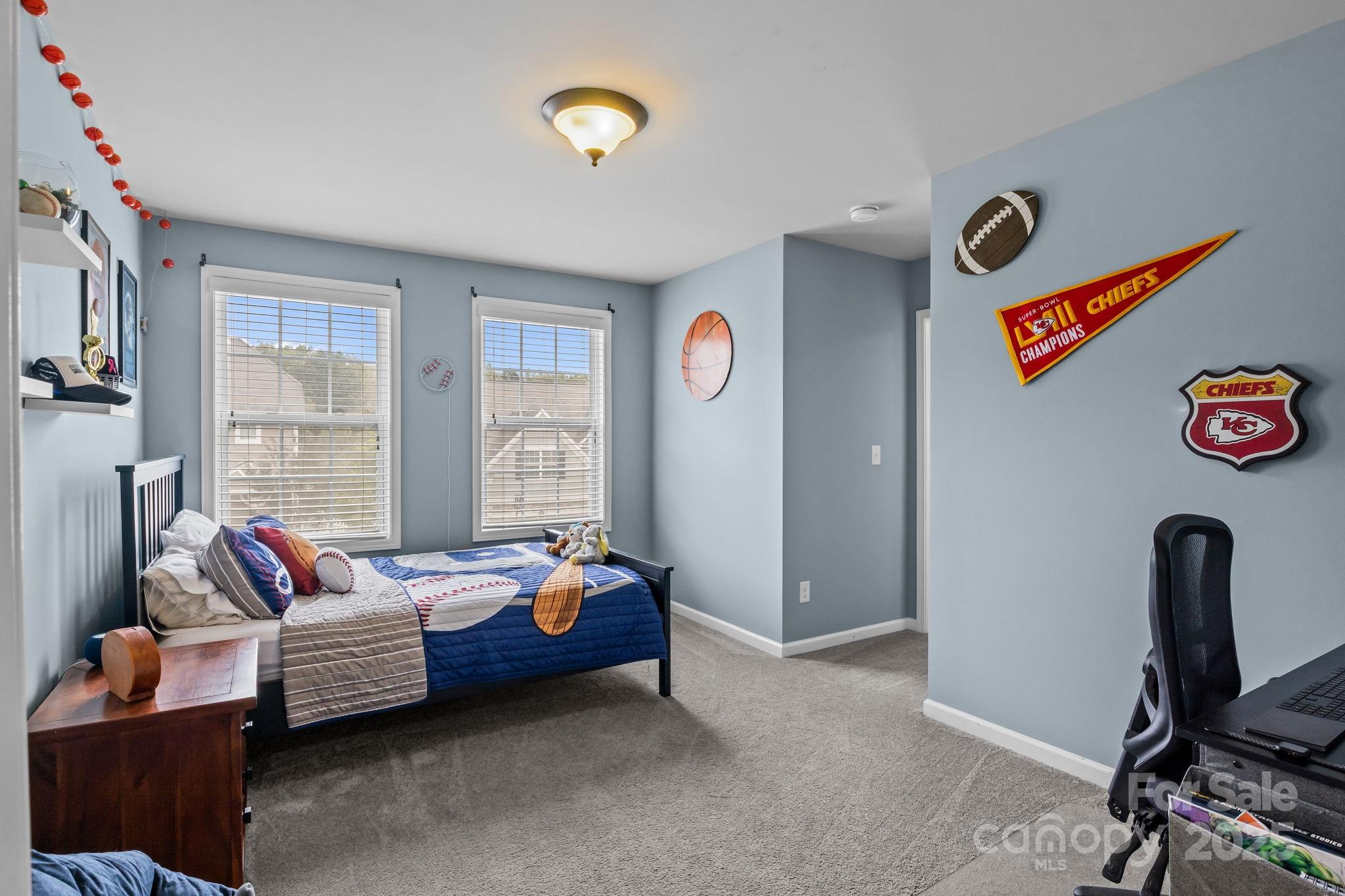 3427 Streamside Drive Davidson, NC 28036 - Photo 12 of 23 a bedroom with furniture and a window
