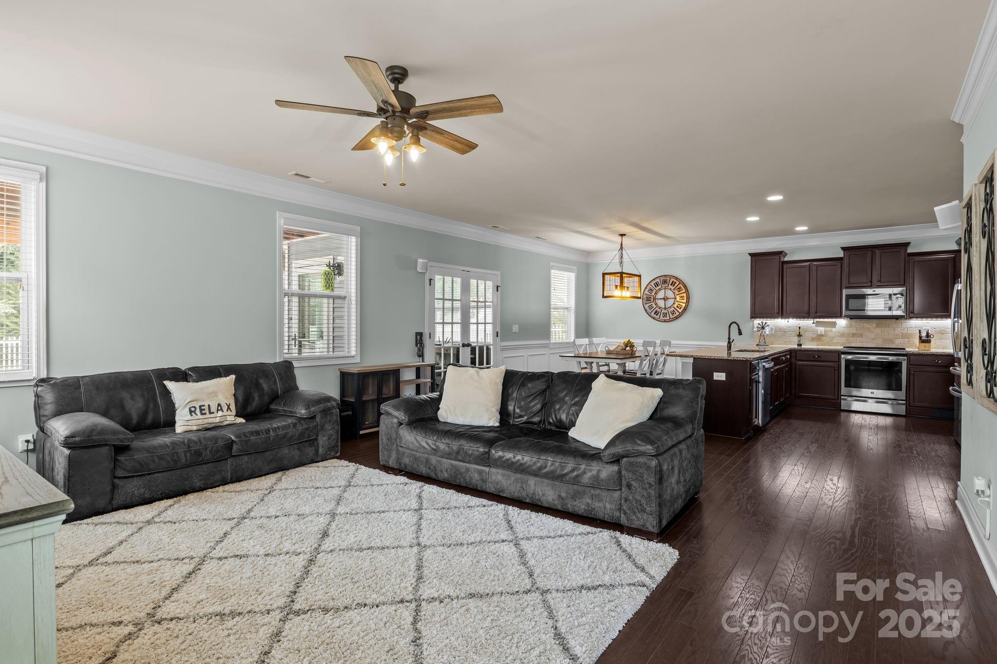 3427 Streamside Drive Davidson, NC 28036 - Photo 4 of 23 a living room with furniture and kitchen view