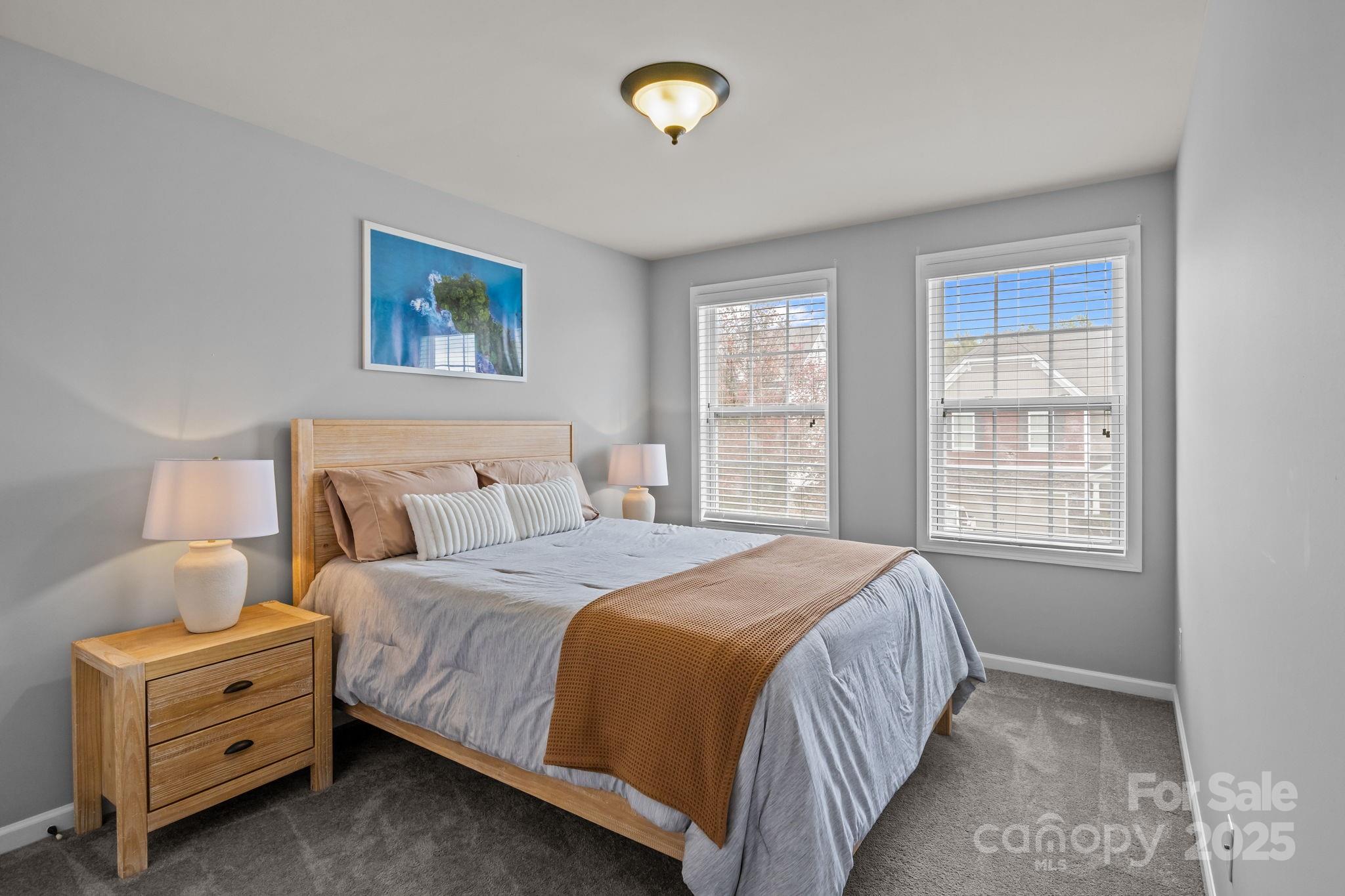 3427 Streamside Drive Davidson, NC 28036 - Photo 10 of 23 a bedroom with a bed and a window